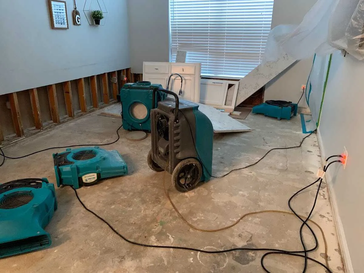 Dehumidifier in flood-cut room for Water Damage Restoration in Sparks